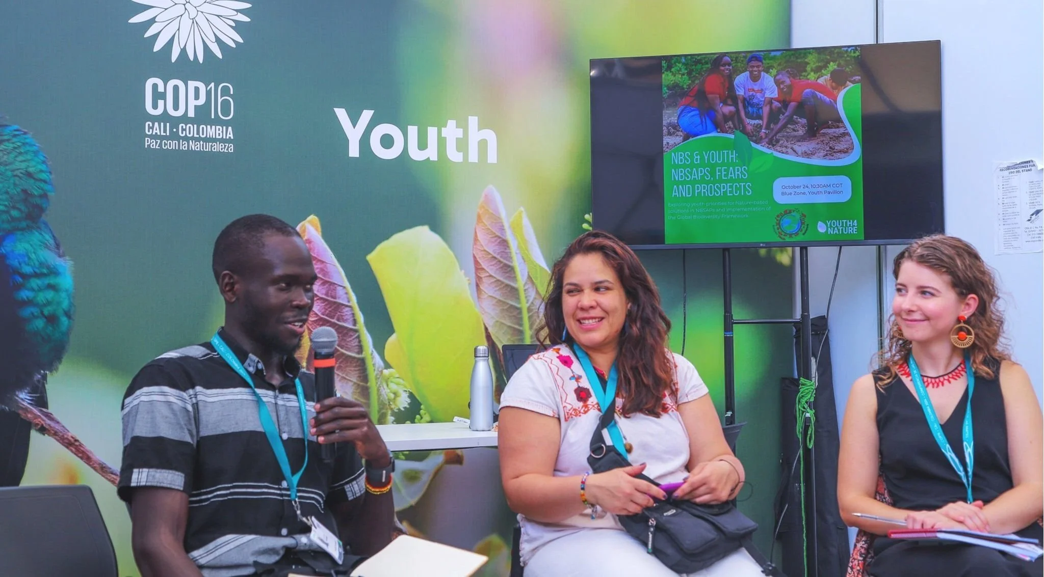  Scholar Aiita speaking at a panel on nature-based solutions at COP16 